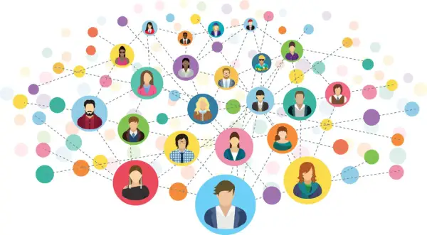 Ilustracja przedstawia sieć kontaktów, gdzie kolorowe kółka z ikonami ludzi łączą się liniami, symbolizując networking i relacje.